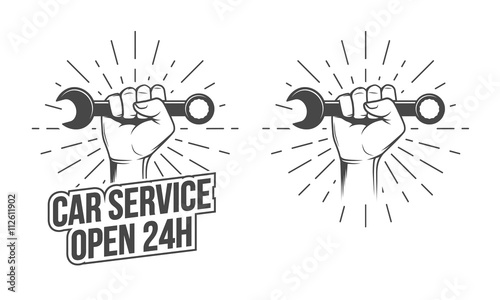 Hand with wrench
