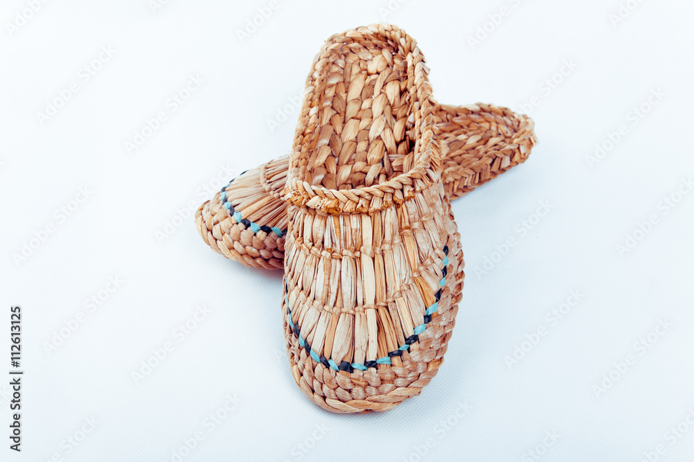 Fototapeta premium Wicker sandals with ornament