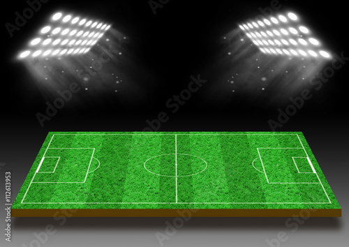 Football field with a lawn under lights
