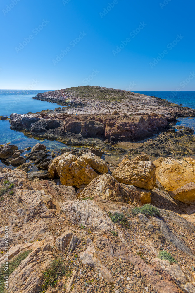 Rocky beach in Mykonos, Cyclades, Greece.