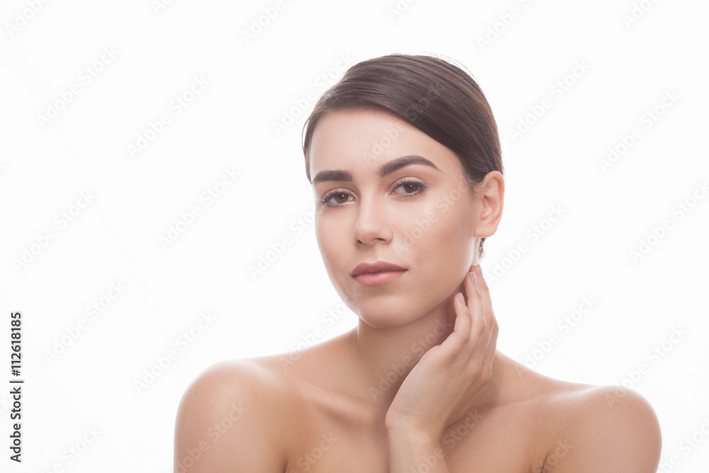 Closeup portrait of smiling lady looking at camera and touching her face over white background. Cosmetic surgery concept. Closeup portrait of smiling lady looking at camera and touching her face over white background. Cosmetic surgery concept.
