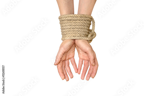 Foto Hands tied with rope isolated on white