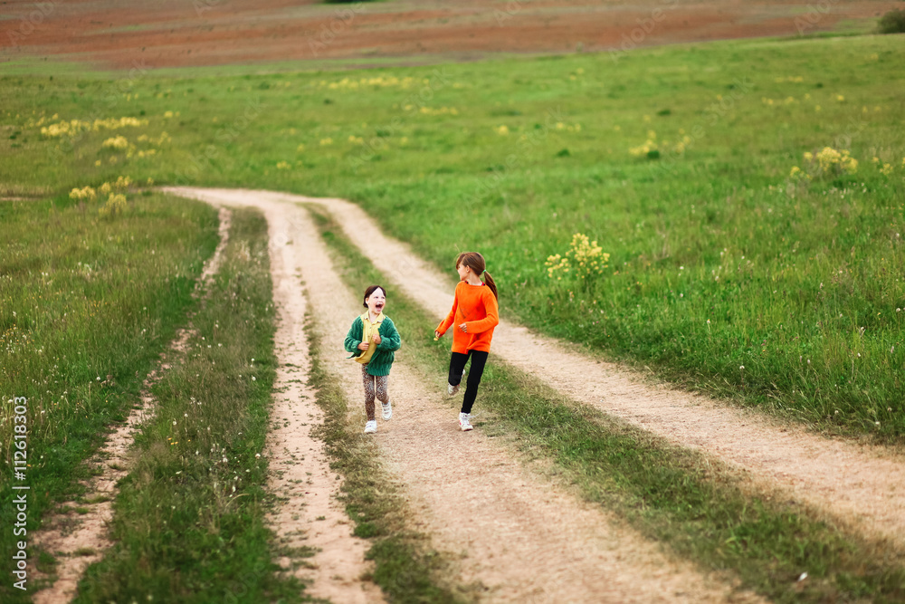 Fototapeta premium The children happy outdoors.