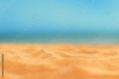 Close up sand with blurred sea sky   Paradise Tropical beach bac