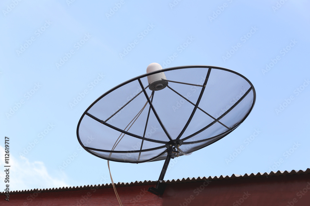 satellite dish on the house roof.