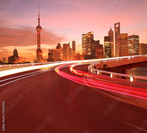 Photography Empty road surface with Shanghai Lujiazui city buildings Dawn