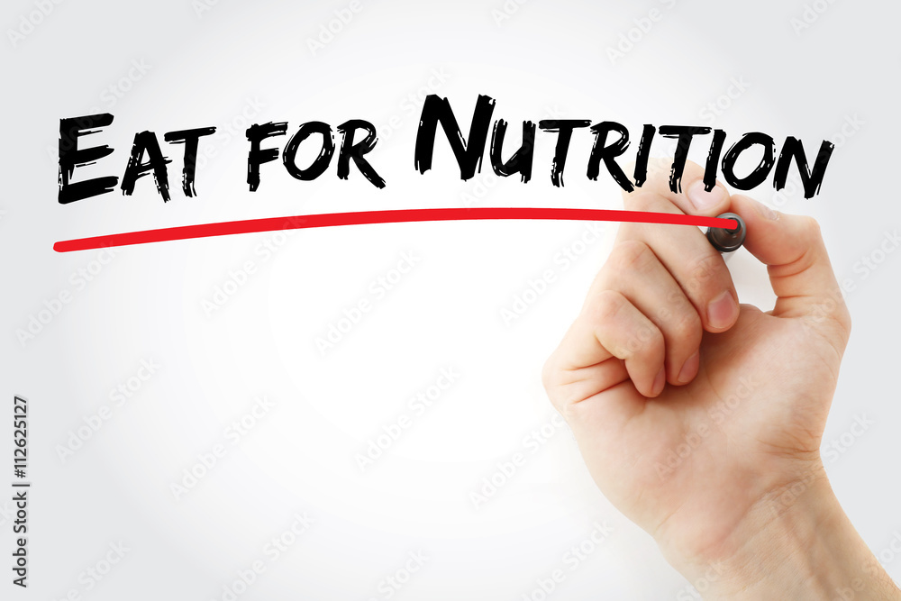 Fototapeta premium Hand writing Eat for nutrition with marker, health concept