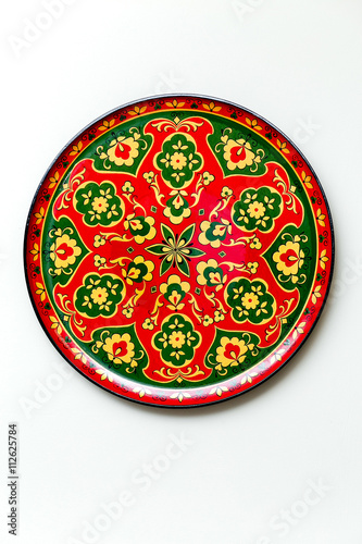 Wooden dishes  painted with floral ornament in the style of Khokhloma Russian