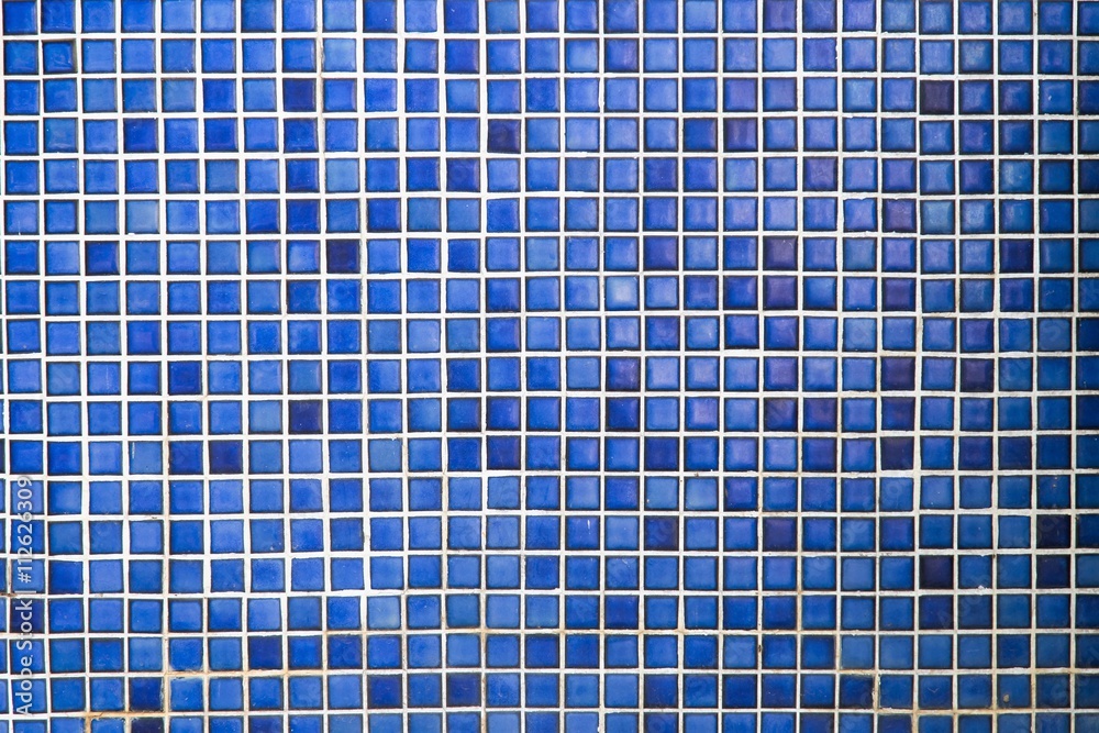 old blue ceramic wall tiles background