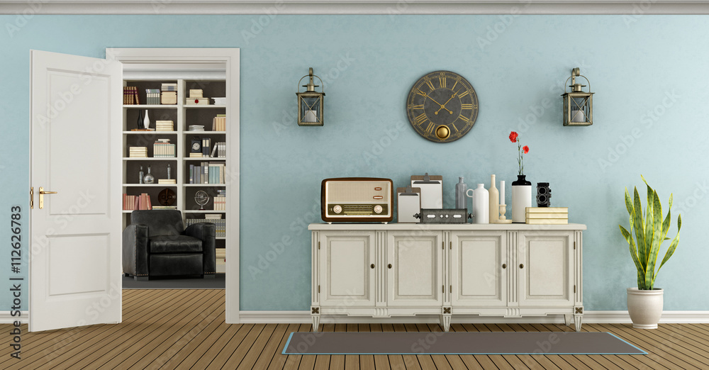 Retro living room with sideboard and open door Retro living room with sideboard and open door