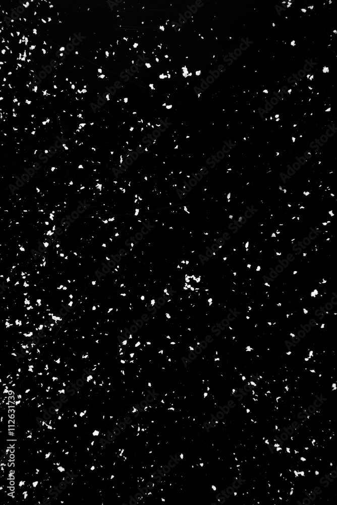 Fototapeta premium Snow flakes on dark background