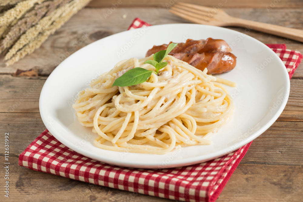 Spaghetti cream sauce chopped mushroom with sausage. Spaghetti cream sauce chopped mushroom with sausage.