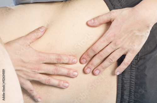 Wallpaper Mural Closeup of hands of pysioteraphty doing manipulation to man pati Torontodigital.ca