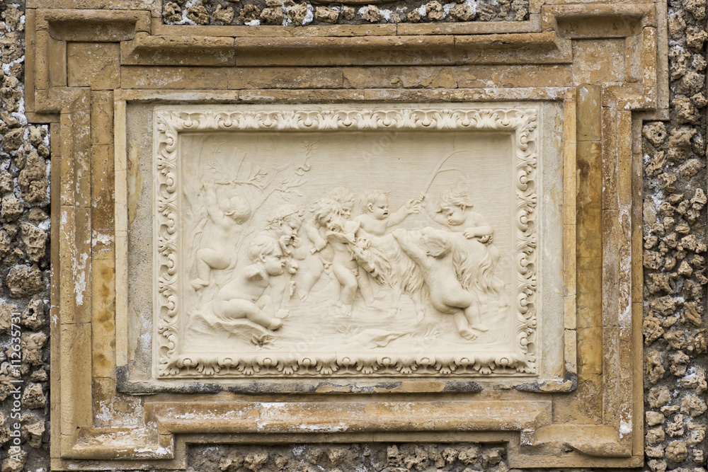 Bas relief in a public park in Rome. Italy