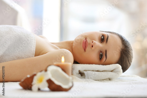 Woman relaxing in spa salon