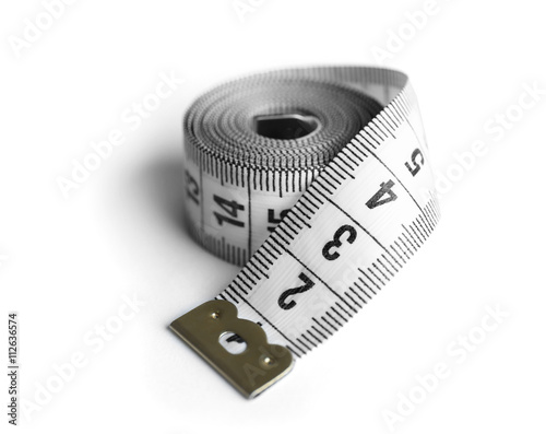 Measuring tape on white background