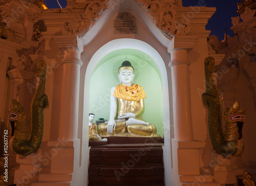 Buddha at Shwedagon pagoda, Yangon, Myanmar photo