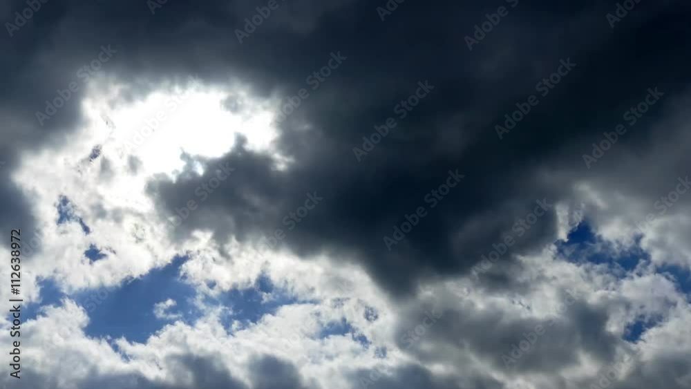 Sun shining through dark clouds. Timelapse Sun shining through dark clouds. Timelapse