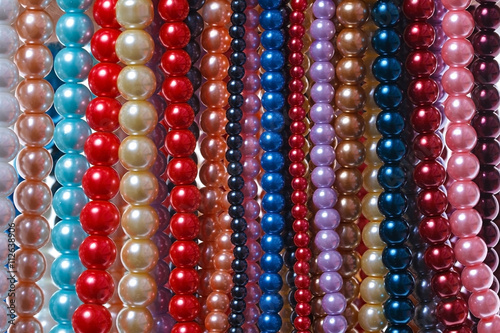 Hanging multi-colored beads on a string