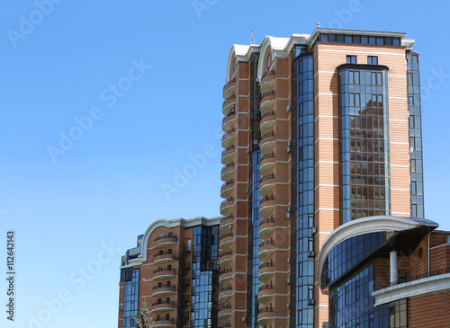 Modern buildings on sky background