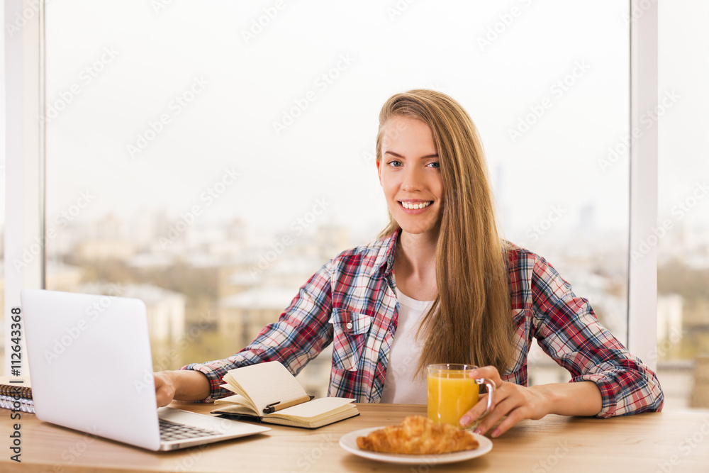 Smiling woman at desk Smiling woman at desk