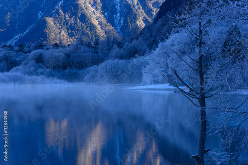 Fototapeta Naklejka Na Ścianę i Meble -  Lake Taisho in the early morning in Kamikochi, Nagano, Japan