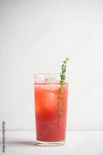 Cocktail made of Sicilian orange on the rustic wooden background