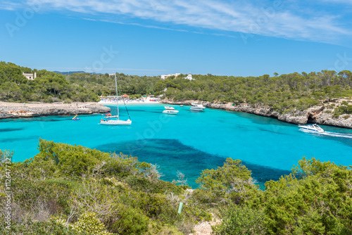 Sailing boats at Cala Mondrago - beautiful beach and coast of Mallorca