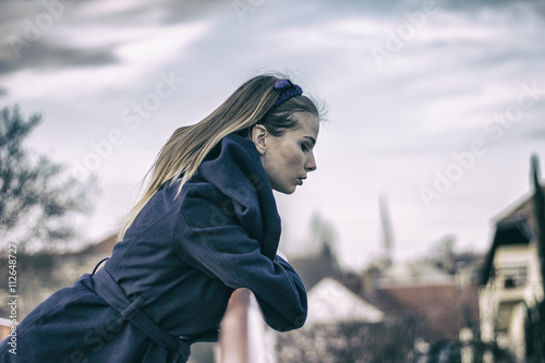 Beautiful girl next to the river