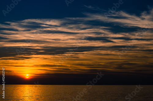 dramatic sky and orange sunset © katarinagondova