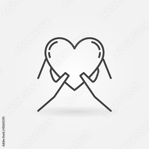 Hands holding heart icon