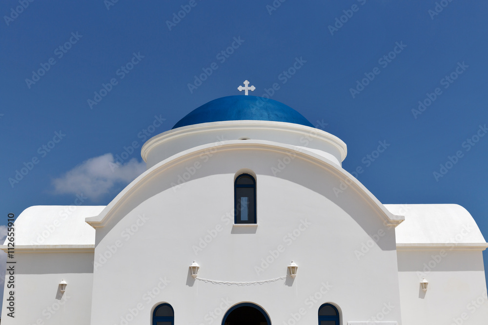 White Greek chapel closeup in Paphos, Cyprus