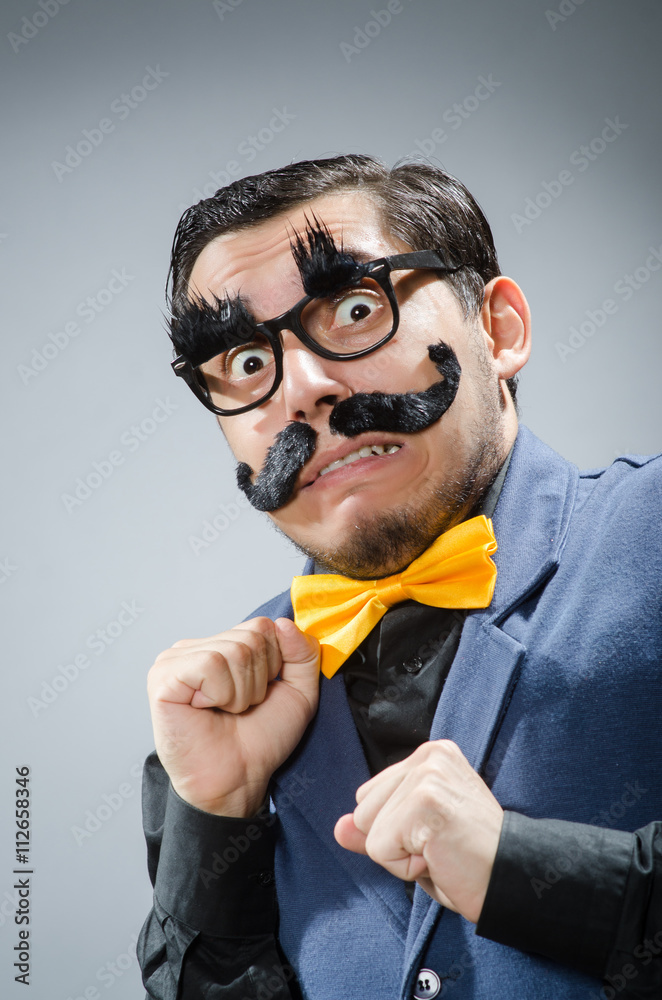 Fototapeta premium Funny man against dark background