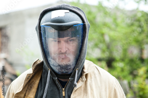Portrait of a man working in a protective helmet © Kiryakova Anna