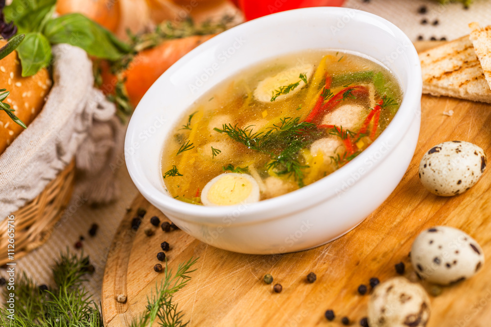 Soup with chicken meatballs, vegetable and quail eggs Soup with chicken meatballs, vegetable and quail eggs