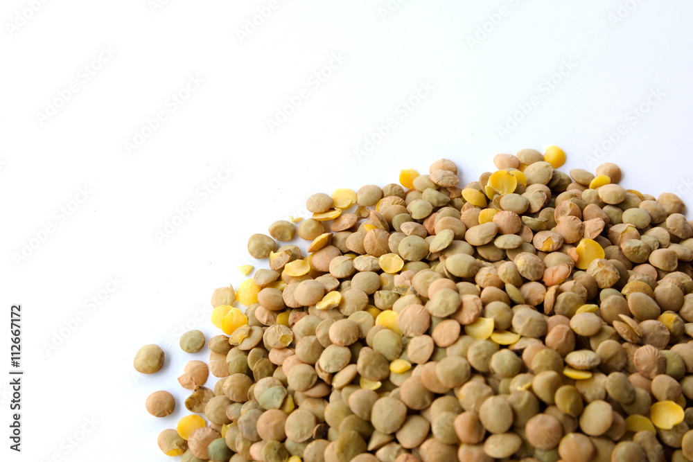 Lots of lentils isolated on white Lots of lentils isolated on white