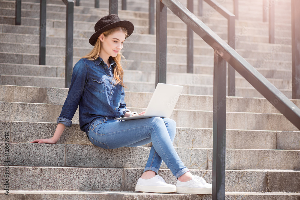 Modern young woman using technologies Modern young woman using technologies