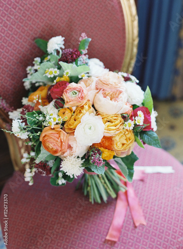 Bridal bouquet on a chair 