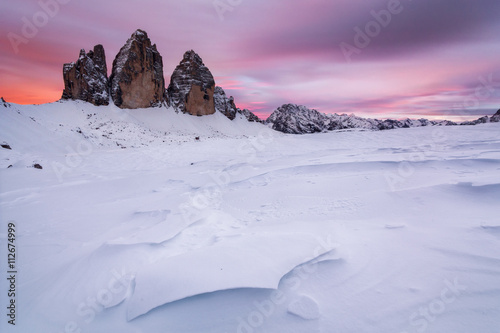 Rocks protruding from snow covered landscape