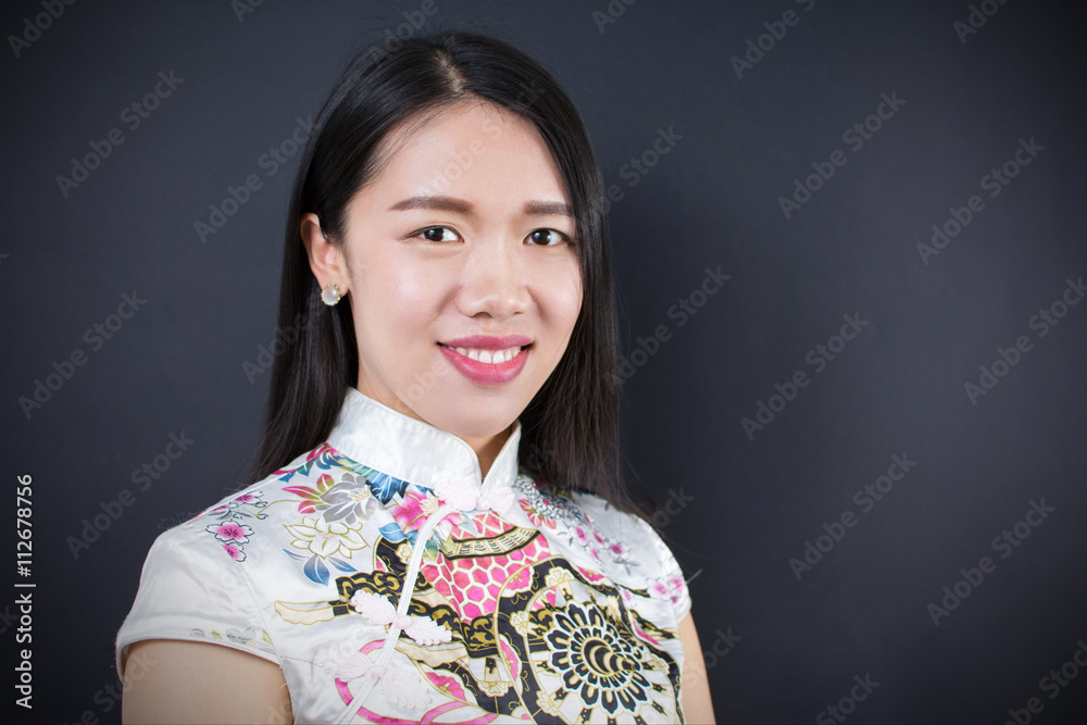 Portrait of a beautiful young asian woman in a dress Portrait of a beautiful young asian woman in a dress