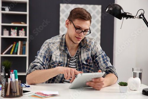 Man using tablet at office