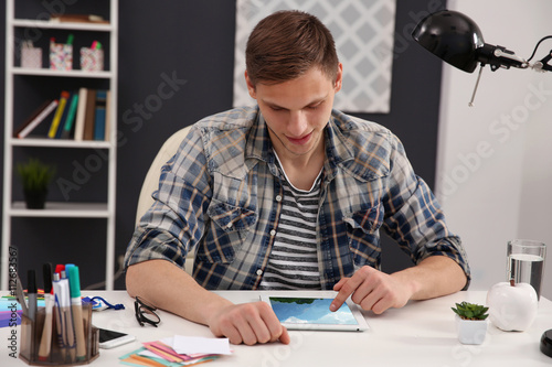 Man using tablet at office