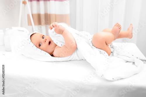Little baby in towel after ...