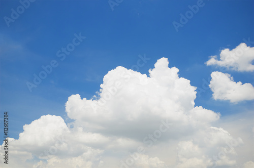 White puffy cumulus cloud on blue sky © eaglesky