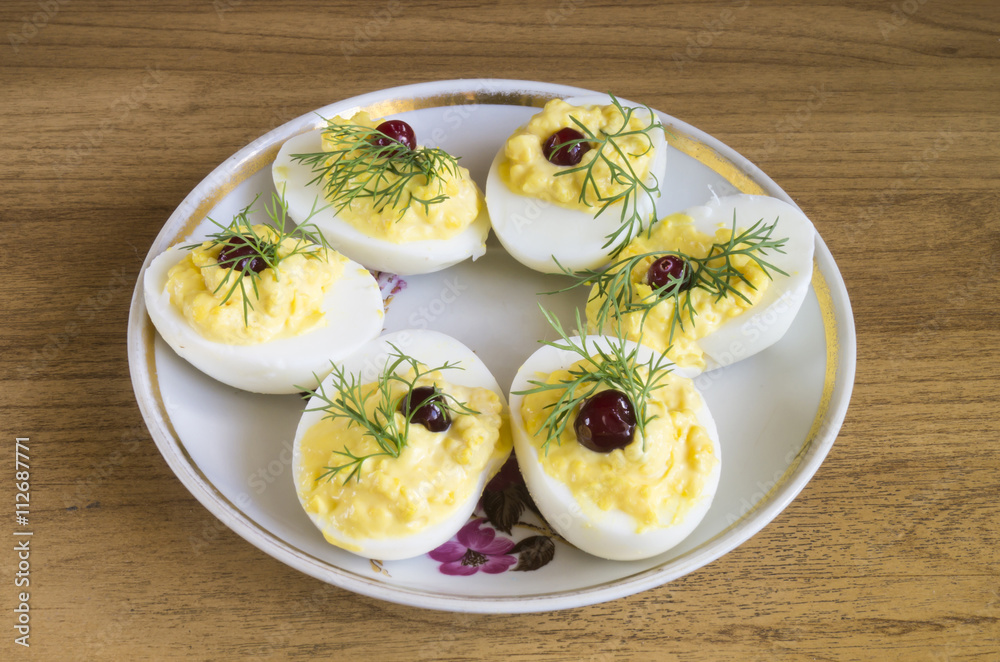 Stuffed egg with cranberry and green dill Stuffed egg with cranberry and green dill