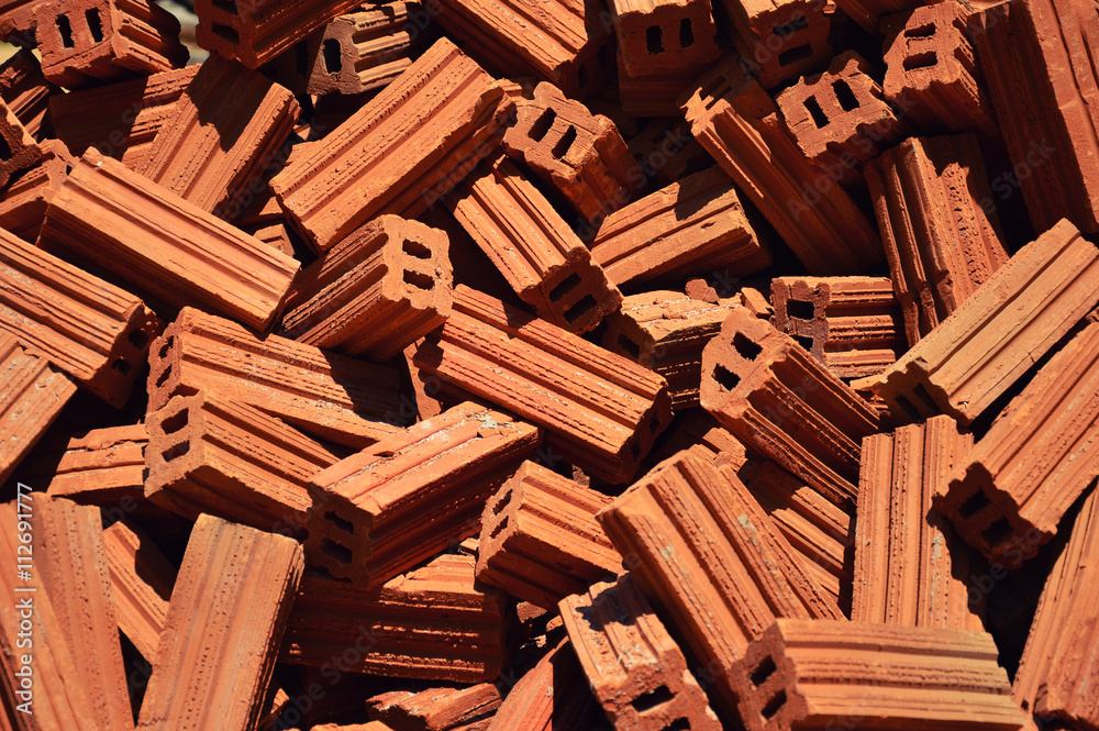 Stack of red brick, selective focus. Stack of red brick, selective focus.