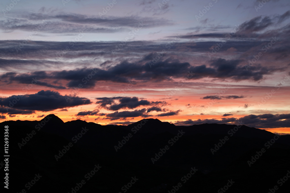 Sunrise and the silhouette of the mountain