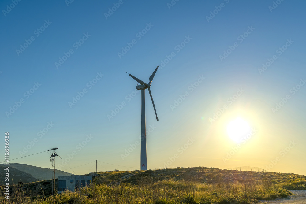 Beautiful sunset above the windmills on the field... Beautiful sunset above the windmills on the field...