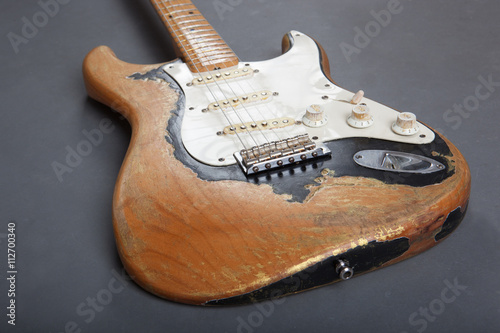 Electric guitar on grey background