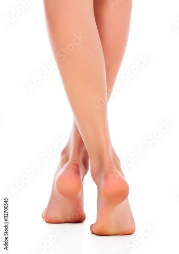 Female feet isolated on white background © Nobilior